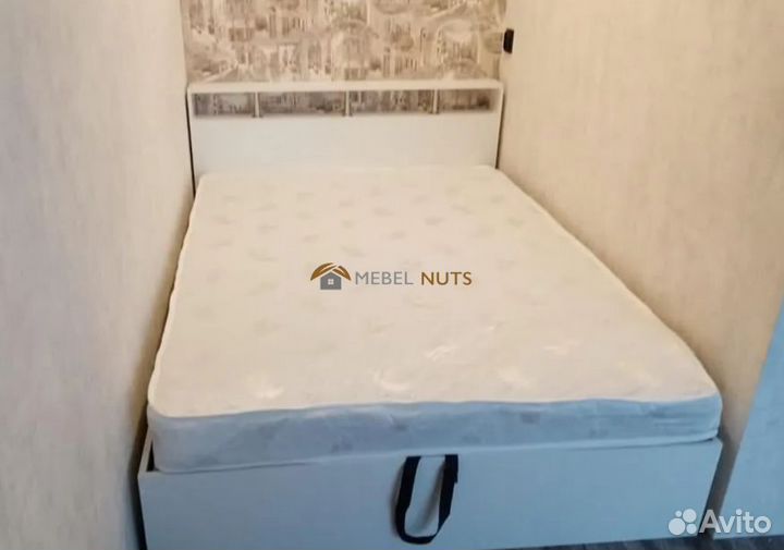 Кровать с подъемным механизмом