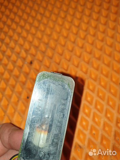 Фонарь подсветки номера Ford Focus