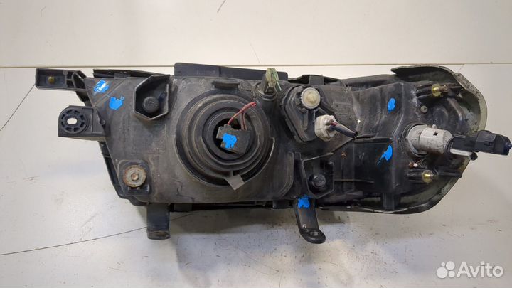 Фара (передняя) Mitsubishi Montero Sport / Pajero