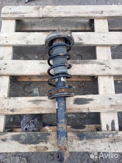 Стойка амортизатора заднего левого Hyundai Sonata