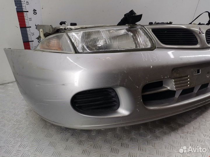 Бампер (ноускат) для Mitsubishi Carisma