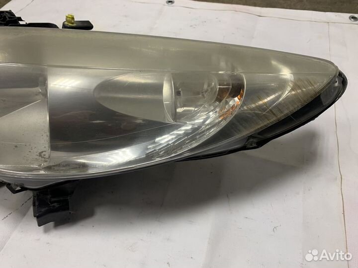 Фара передняя левая Peugeot 207