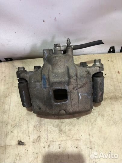 Суппорт передний левый Mitsubishi Lancer 10 CY3A