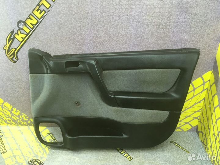 Обшивка двери Опель Астра G Джи