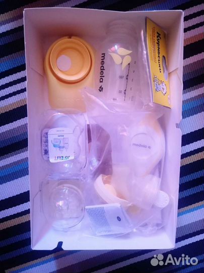 Молокоотсос medela ручной