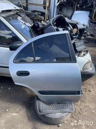 Дверь задняя правая альмера н16