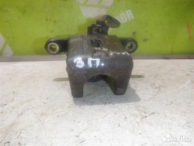 Суппорт задний правый Хендай Лантра 96-00