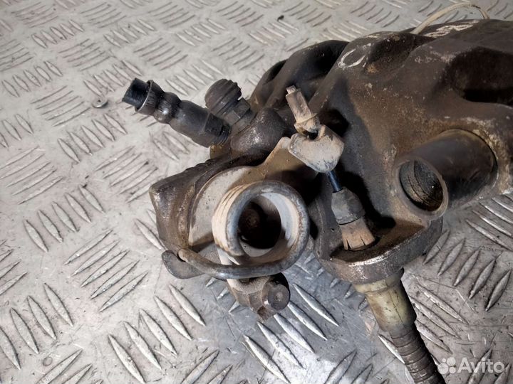 Суппорт задний левый Ford Tourneo Connect