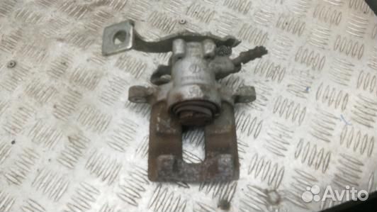 Суппорт тормозной задний левый toyota corolla E15