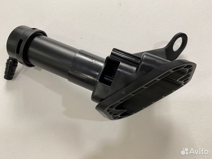 Форсунка омывателя фар