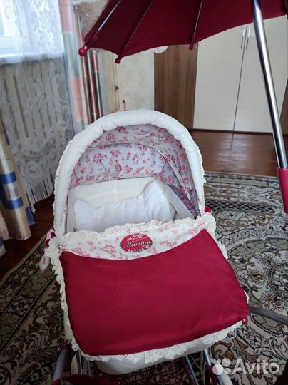 Игрушечная коляска