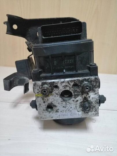 Блок ABS Nissan Almera Tino V10