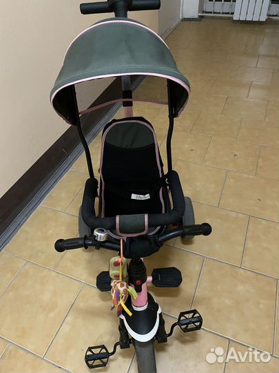 Трехколесный велосипед с ручкой