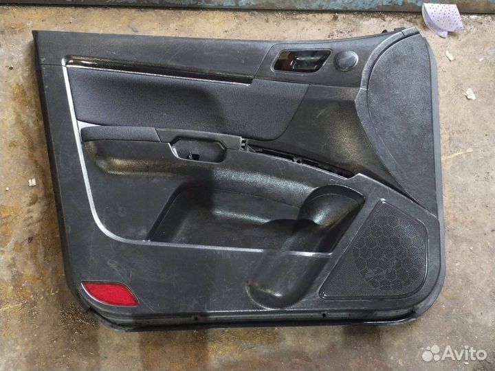 1068002600 Обшивка двери п. лев. Geely Emgrand EC7