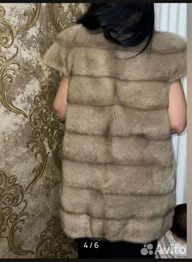 Меховая жилетка