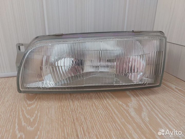 Фара левая Mitsubishi Lancer / Mitsubishi Libero
