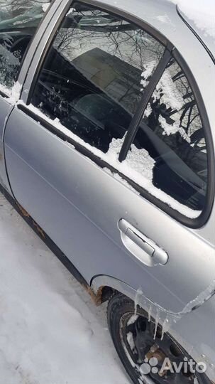 Дверь задняя левая Nissan almera N15