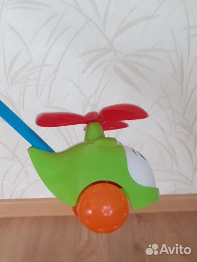 Игрушка каталка с ручкой