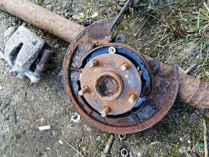 Механизм развода задних тормозных колодок Toyota