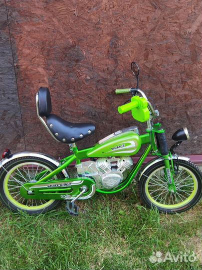 Детский велосипед в виде мотоцикла