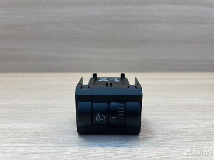 Кнопка корректора фар Skoda Rapid