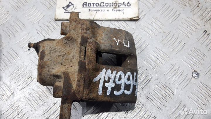 Суппорт тормозной передний левый Renault Logan 1