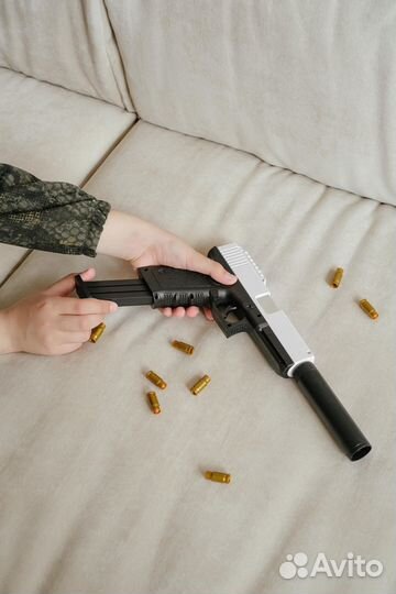 Игрушечное оружие Пистолет с вылетающими гильзами