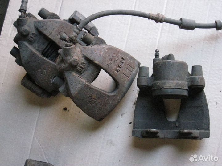 Передний суппорт на Mazda 3 bk