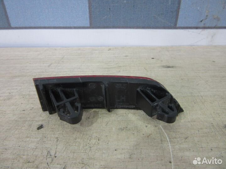 Отражатель в бампер задний левый VW Tiguan 2