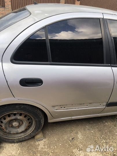 Дверь задняя правая almera N16