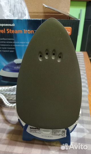 Маленький дорожный утюг