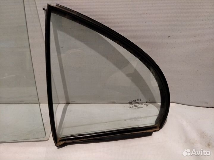 Стекло двери задней левой (форточка) Geely emgrand