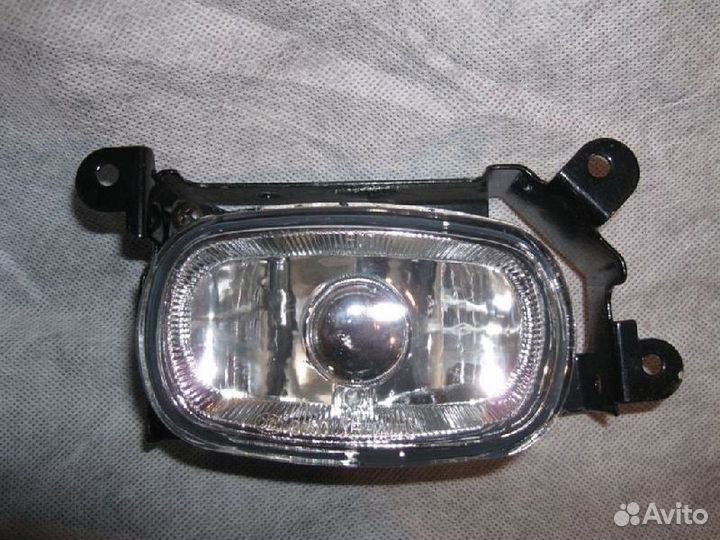 Фара противотуманная передняя левая Mitsubishi