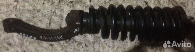 Стойка амортизатора в сборе правая Санг Енг Кайрон