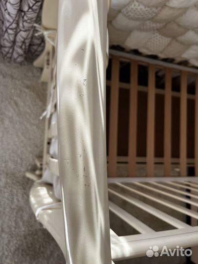 Детская кроватка с продольным маятником