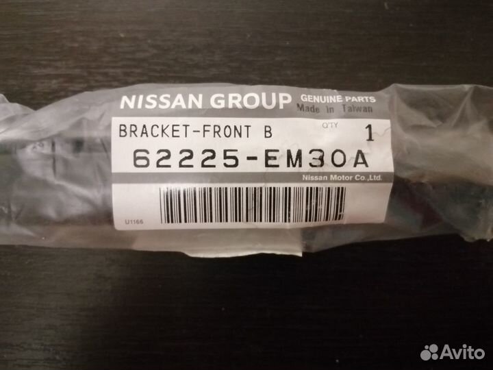 Кронштейн бампера переднего, левый. Nissan tiida