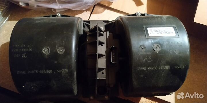 1854877 Мотор отопителя Scania