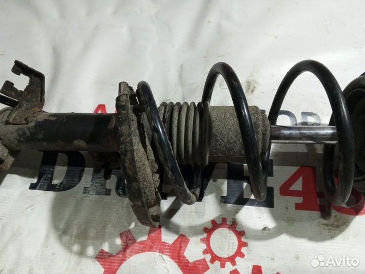 Амортизатор передний правый Nissan Note 11 wagon