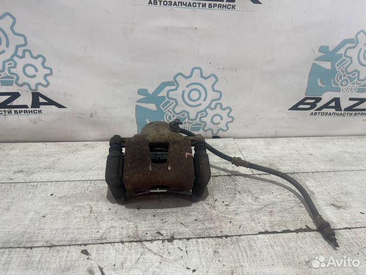 Суппорт передний левый Chevrolet Lacetti