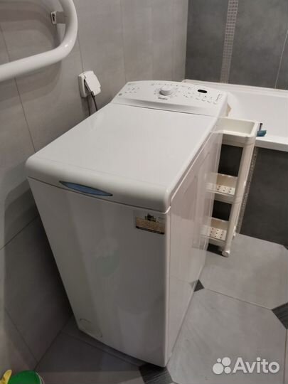 Стиральная машина с вертикальной загрузкой