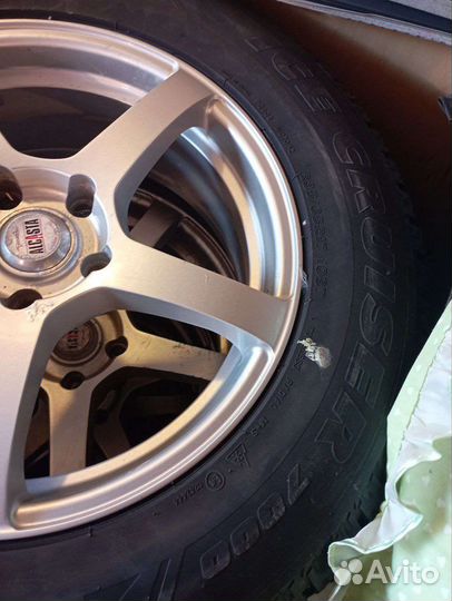Зимняя резина на литых дисках 235/65/17