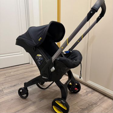 Коляска автокресло doona plus