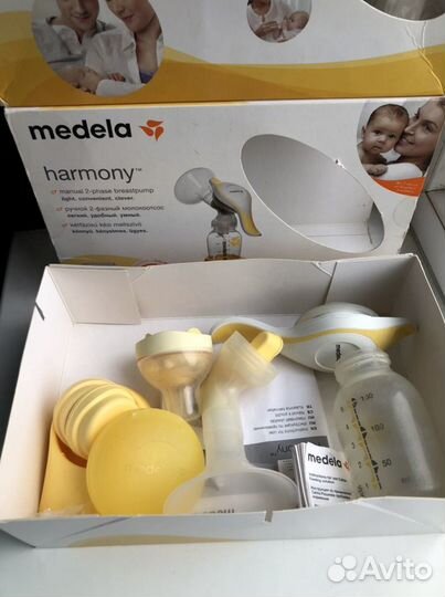 Молокоотсос ручной medela + накладки