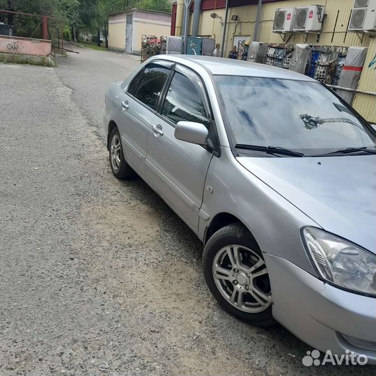 Mitsubishi Lancer 1.6 МТ, 2009, 380 000 км