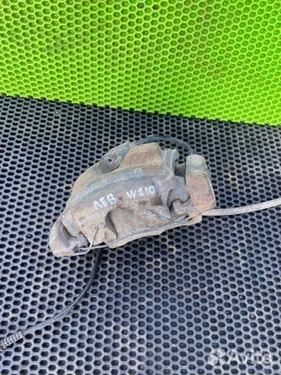 Тормозной суппорт Mercedes-Benz W210 передний левы