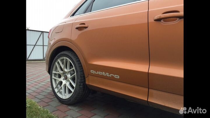 Наклейки Quattro на Audi 4G0064317Y9B чёрные и сер