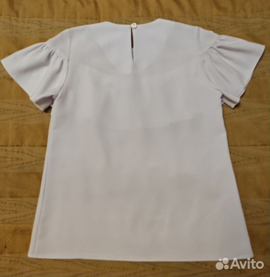 Блузка на девочку 134