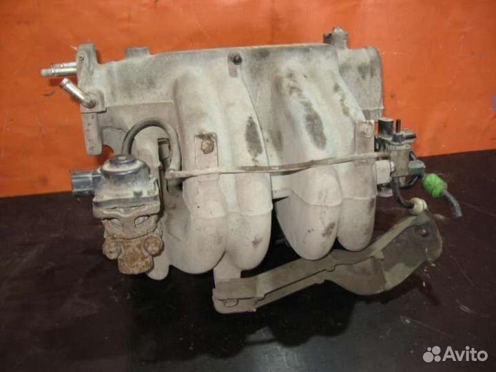 Коллектор впускной Mazda 323 (BJ) 1998-2003