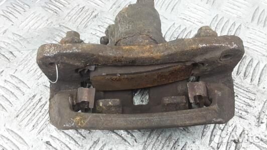 Суппорт тормозной задний левый mitsubishi galant 8