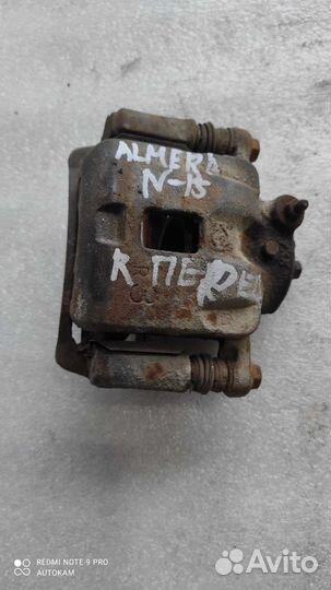 Суппорт тормозной передний Nissan Almera n15